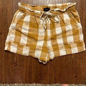 Mustard yellow and white cotton linen shorts with drawstrings